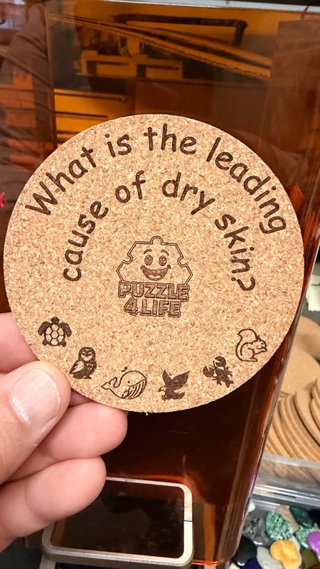 Branded puzzle-piece cork coaster